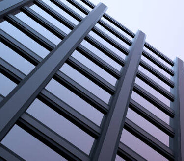 Modern building, business center, multi-storey building against the sky. Architectural design of a modern building. 3D render